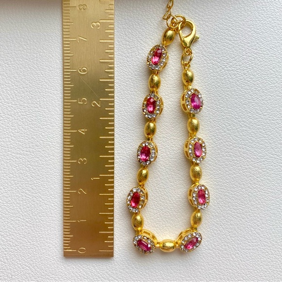 Elegant Gold and Pink Gemstone Bracelet - Picture 2 of 2
